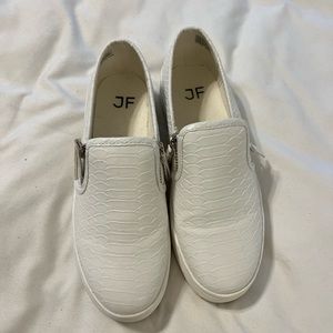 White slip-on sneakers